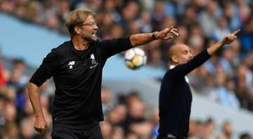 Klopp e Guardiola se enfrentam pela Premier League - Getty Images