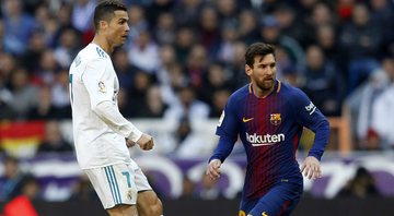 Messi e Cristiano Ronaldo se enfrentando no Campeonato Espanhol - GettyImages