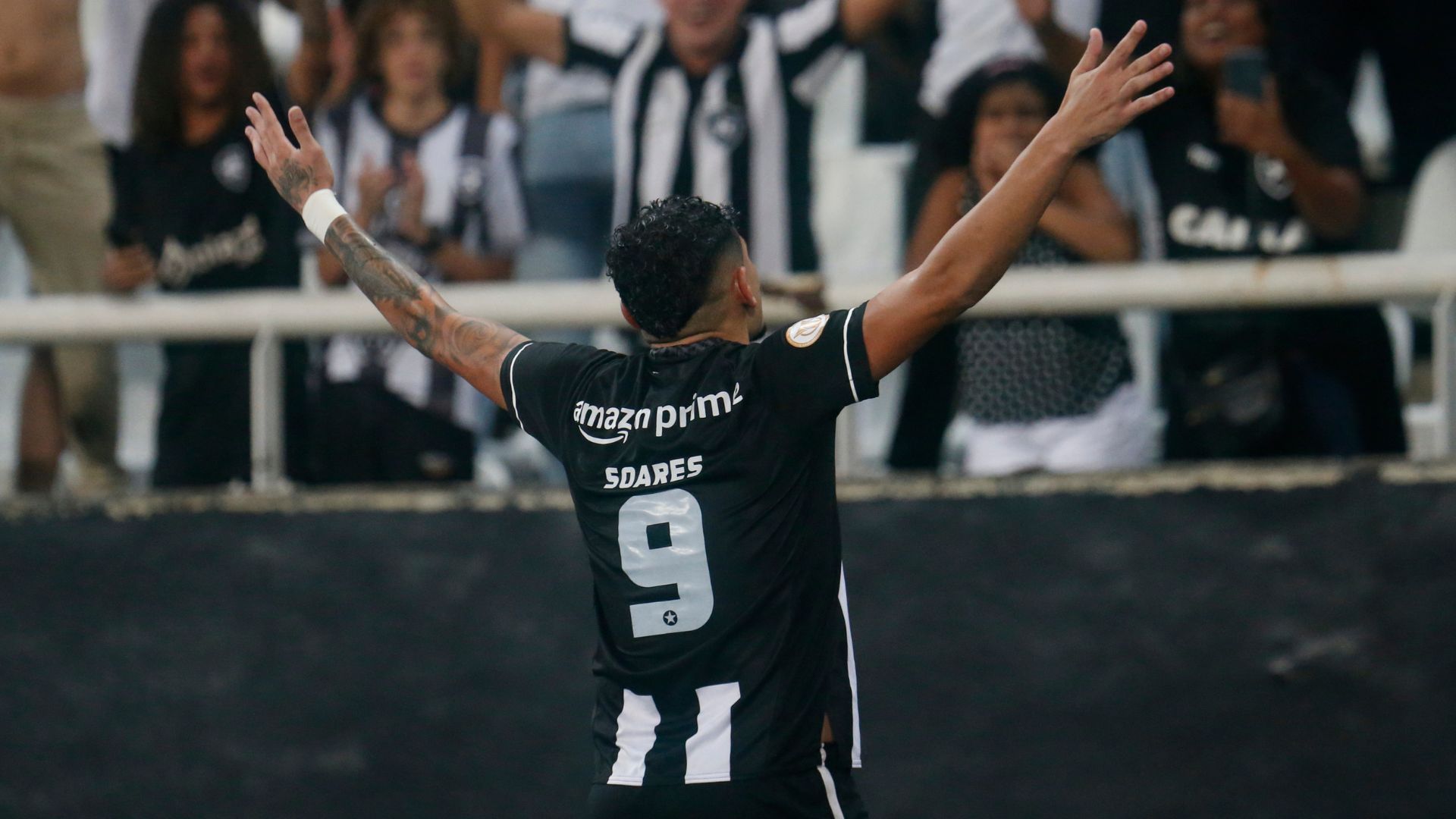 Tiquinho Soares comemorando gol pelo Botafogo (Crédito: Vitor Silva / Botafogo)