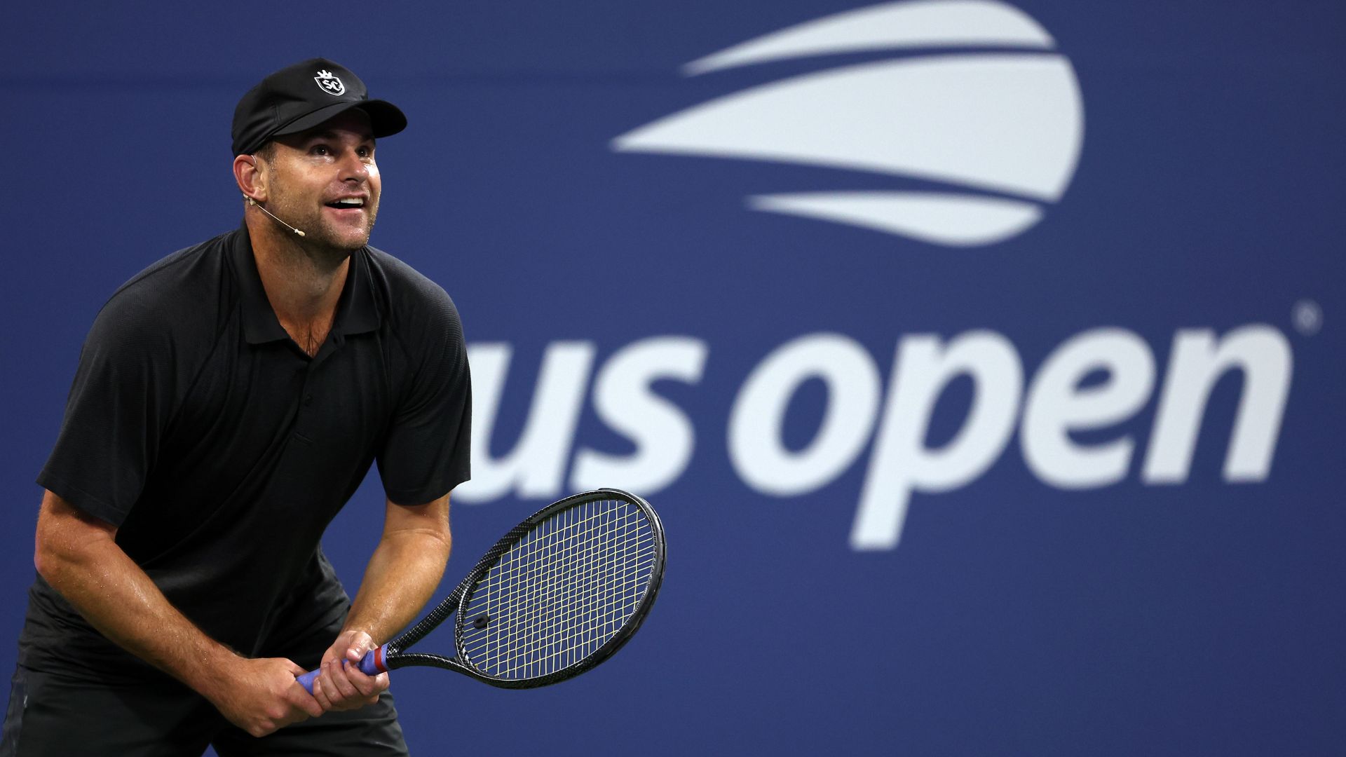 Andy Roddick em ação, em jogo-apresentação do US Open 