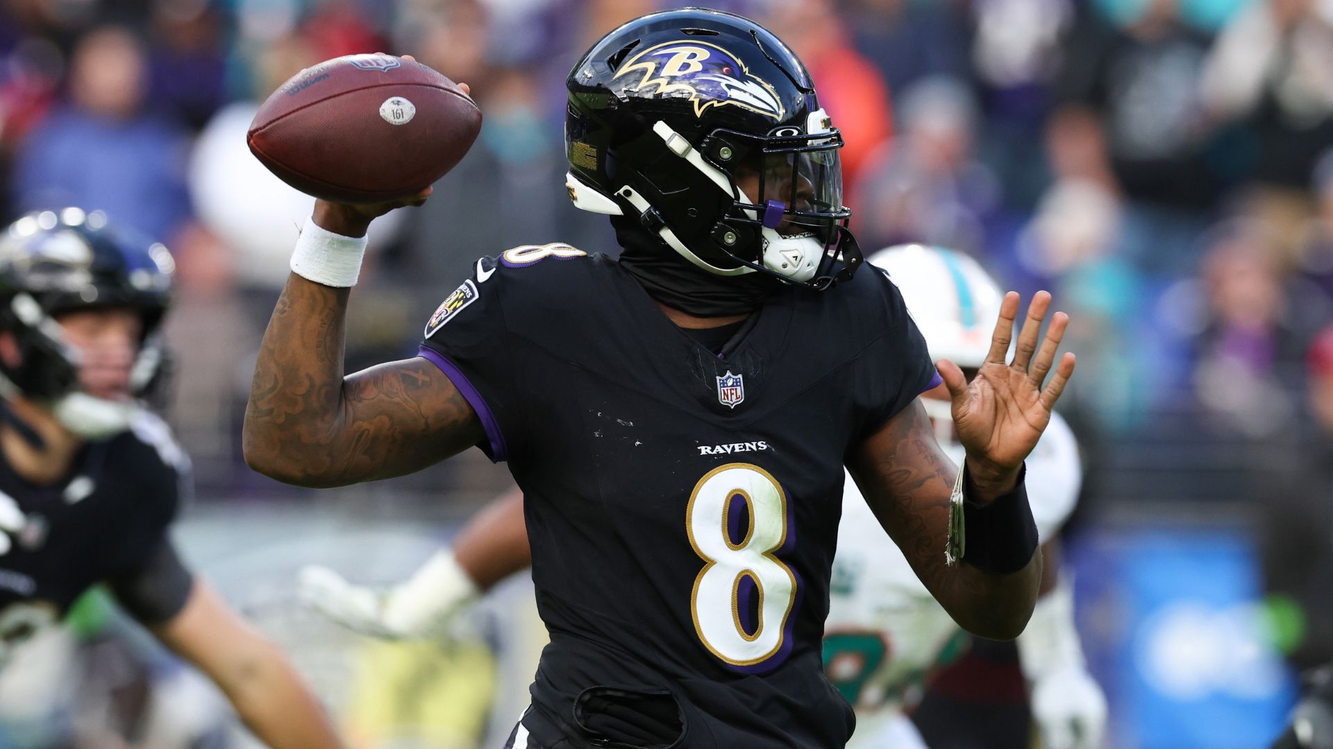 Lamar Jackson em ação pelo Baltimore Ravens (Crédito: Getty Images)