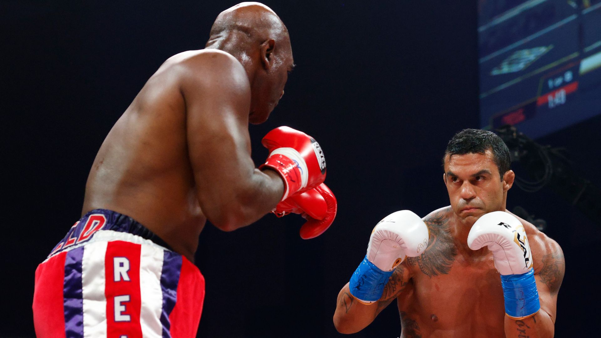 Belfort já teve outros confrontos no boxe, como contra o norte-americano Evander Holyfield (Crédito: Getty Images)